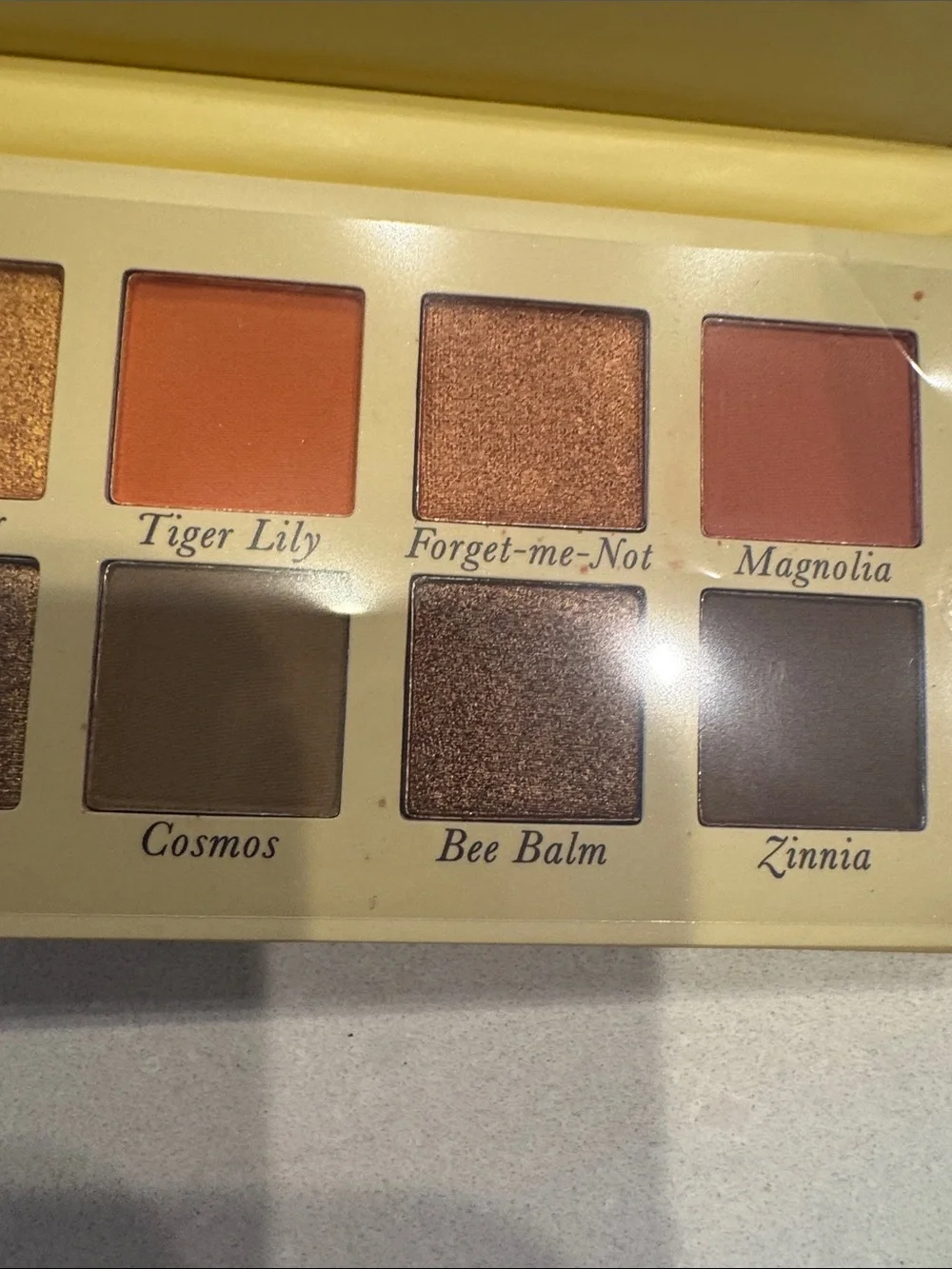 Laura Geller Wildflower Wishes Eyeshadow Palettes - Yellow Floral Packaging